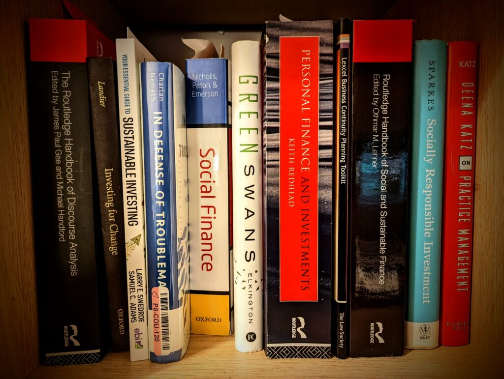 A shelf containing finance books